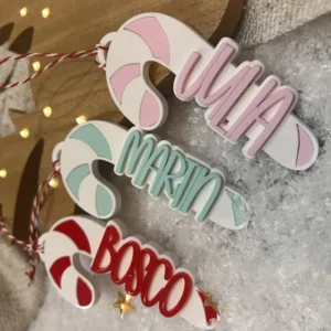 Bastones de caramelo de Navidad personalizados con nombre en rosa, verde menta y rojo